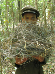 Member of patrol team with wire snares